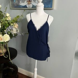 Dark blue top, medium size top.